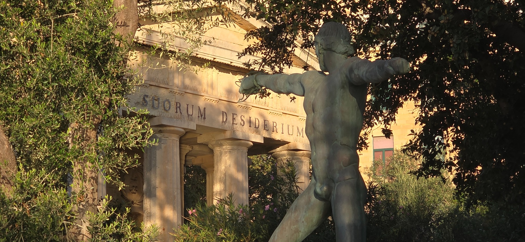 A sculpture beside the Sir Alexander Ball monument